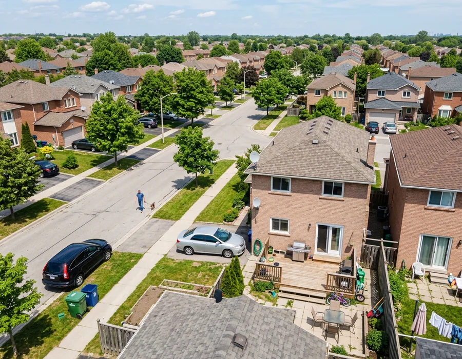 Aerial view of detached and semi-detached homes in a Toronto neighbourhood served across the GTA